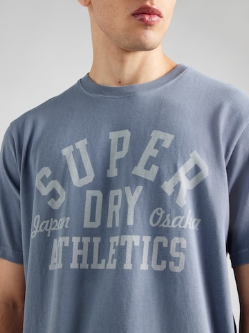 Superdry T-shirt 'ATHLETIC ESS' i blå