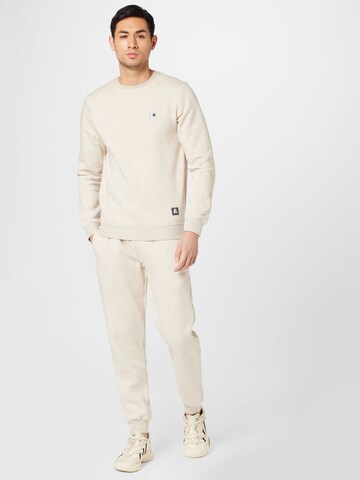 Tapered Pantaloni 'Essential' di Starter Black Label in beige