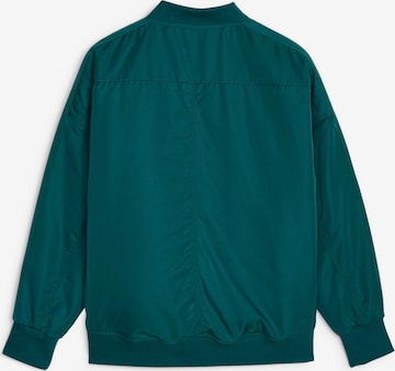 Veste mi-saison 'Shiny' PUMA en vert