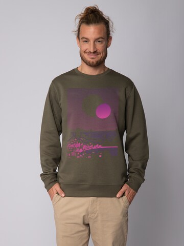 Felpa ' Sun and Moon Skyline ' di Watapparel in verde: frontale