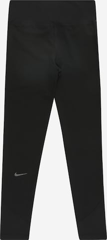 NIKE Sports trousers in Black