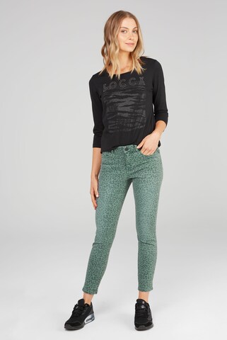 Soccx Slimfit Jeans MI:RA mit Leo Print in Grün