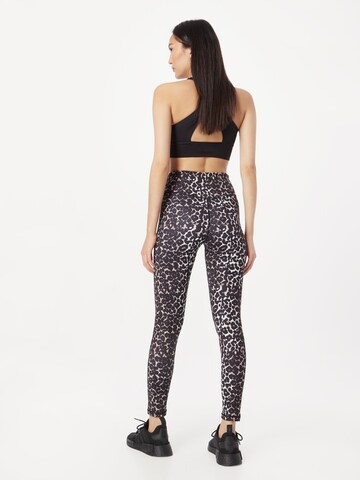 DELICATELOVE Skinny Sportbroek 'NADI' in Bruin