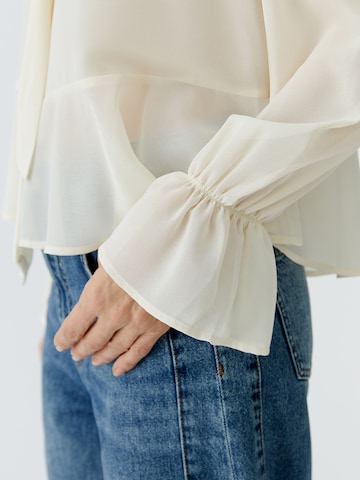 OUI Pusero värissä valkoinen