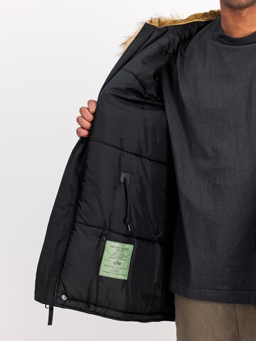 ALPHA INDUSTRIES Vinterparkas 'Explorer' i svart