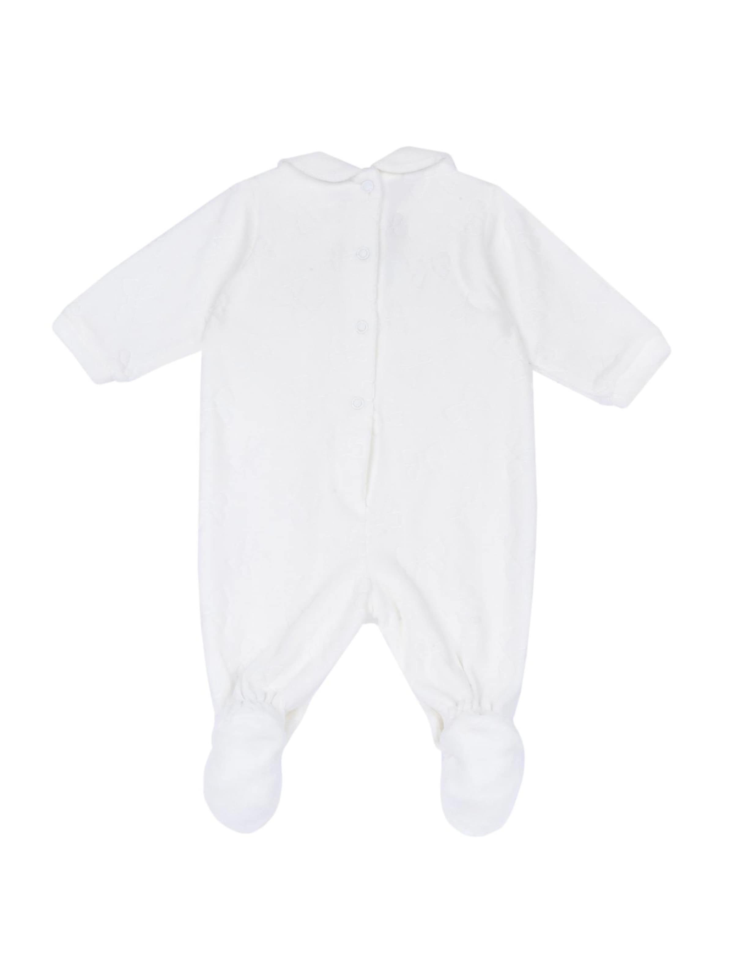 Salopetă de la Chicco pe alb