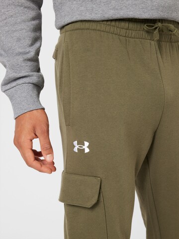 Effilé Pantalon de sport 'Rival' UNDER ARMOUR en vert