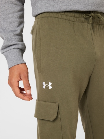 UNDER ARMOUR Дънки Tapered Leg Спортен панталон 'Rival' в зелено