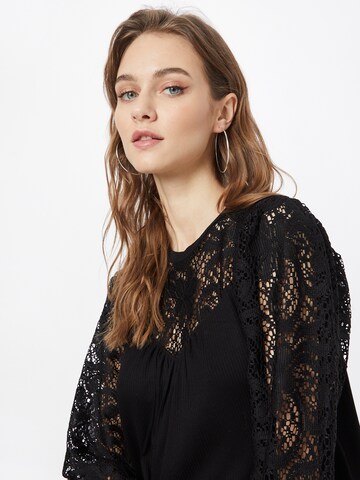 NÜMPH - Camiseta 'LEX' en negro