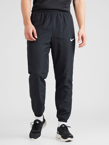 Effilé Pantalon de sport 'Academy' NIKE en noir : devant