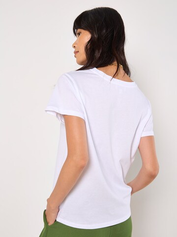 Chemisier ' ' Apricot en blanc
