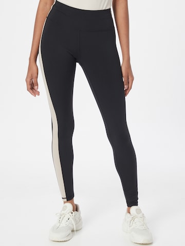 Gilly Hicks Skinny Leggings in Black: front