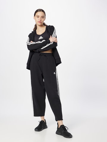 ADIDAS SPORTSWEAR Loose fit Sports trousers 'Essentials' in Black