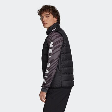 Gilet de sport 'Essentials Light Down' ADIDAS SPORTSWEAR en noir