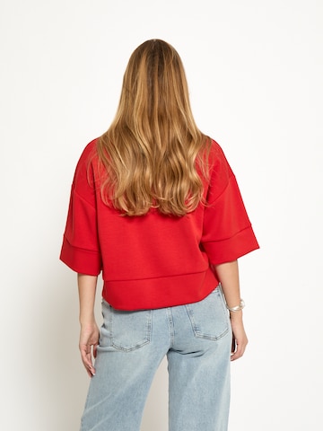 Peppercorn Sweatshirt 'Minnie' in Orange