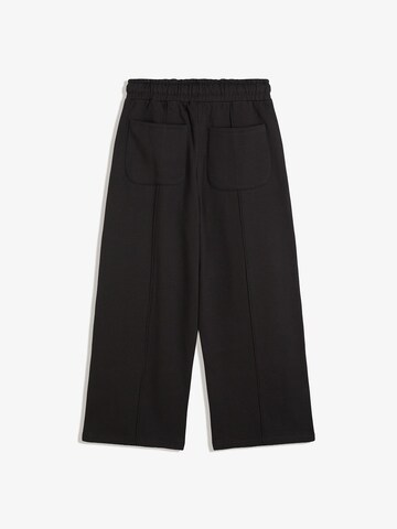 Baggy Pantaloni di Bershka in nero