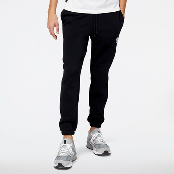 Effilé Pantalon de sport 'NB Hoops Fundamentals Pant' new balance en noir : devant