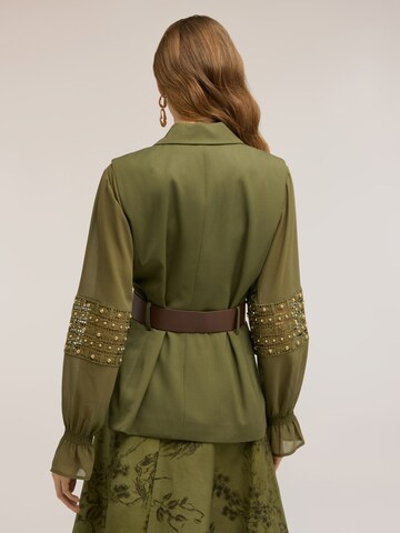 Gilet MOTIVI en vert