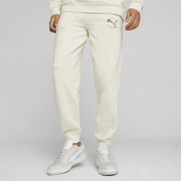 Effilé Pantalon de sport PUMA en beige : devant