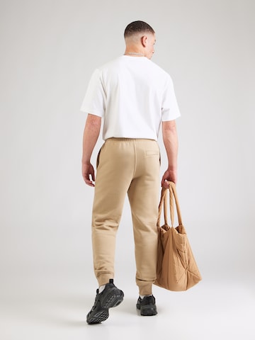 Nike Sportswear Tapered Byxa 'CLUB' i beige