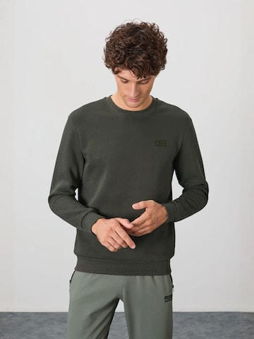 Sweat-shirt Tommy Life en vert
