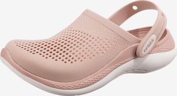 Crocs Clogs in Pink: front