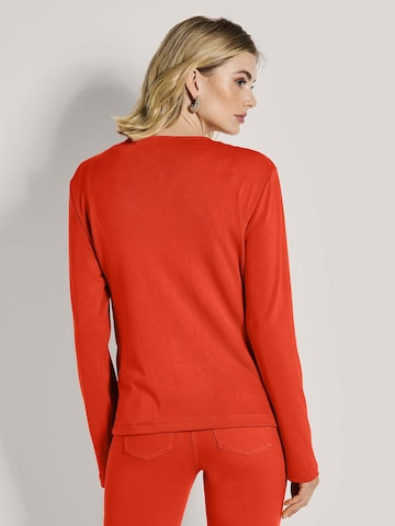 MADELEINE Gebreid vest in Oranje