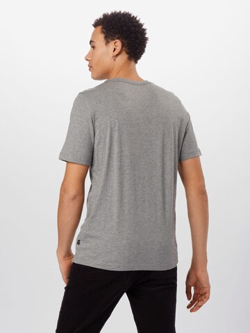 PUMA Функциональная футболка 'Essentials' в Серый