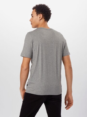 PUMA Performance Shirt 'Essentials' in Grey