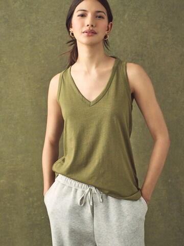 Next - Top en verde