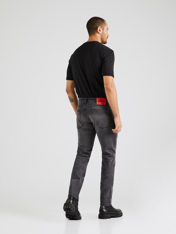 Slimfit Jeans '734' di HUGO in grigio