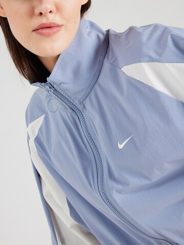 Nike Sportswear Between-season jacket in Blue