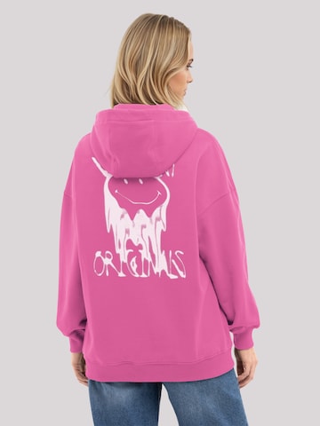 Sweat-shirt 'Smiley Originals Punk Drip Streetwear' F4NT4STIC en rose