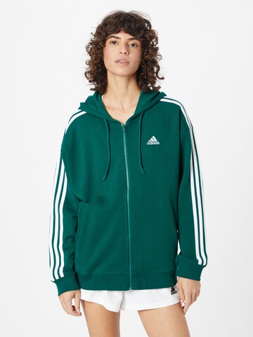 ADIDAS SPORTSWEAR Спортна жилетка с качулка 'Essentials ' в зелено: отпред