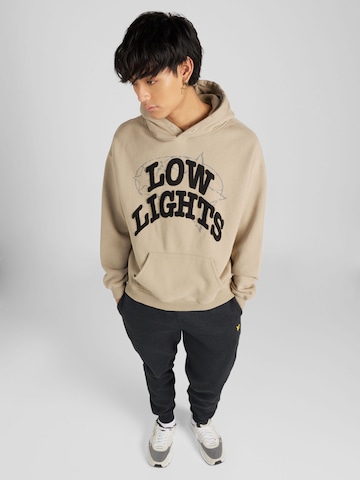 Low Lights Studios - Sudadera 'World-Race' en beige