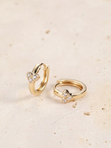 Orecchini 'Amore Huggie' di Dear Me in oro