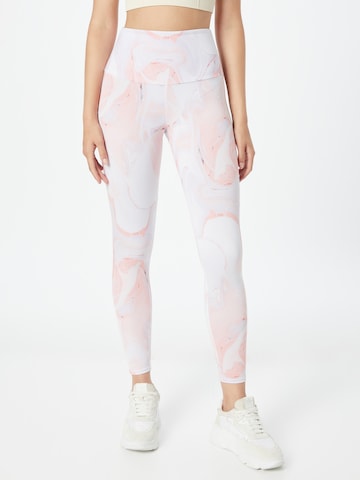 Skinny Pantalon de sport Onzie en blanc : devant