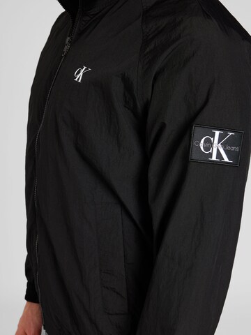 Calvin Klein Jeans Regular Between-Season Jacket 'HARRINGTON' in Black