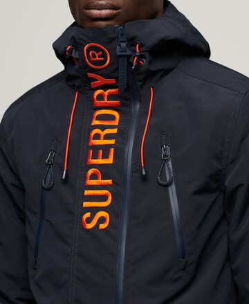 Veste mi-saison 'Ultimate' Superdry en noir