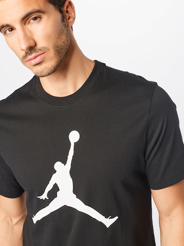 T-Shirt fonctionnel Jordan en noir
