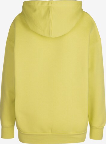 UNDER ARMOUR Athletic Sweatshirt in Yellow