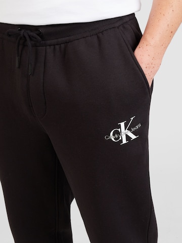 Calvin Klein Jeans Tapered Hose in Schwarz