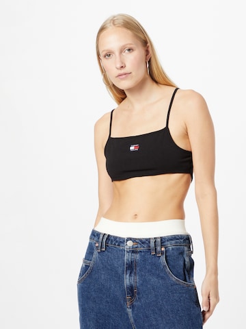 Top de la Tommy Jeans pe negru: față