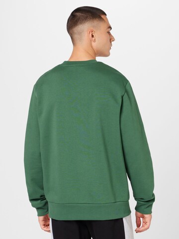 LACOSTE Sweatshirt in Grün