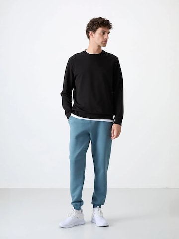 Tommy Life Sweatshirt in Black