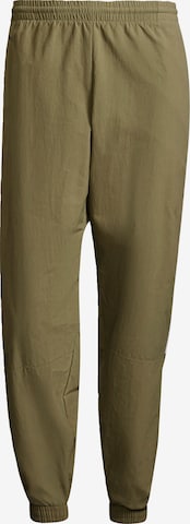 ADIDAS ORIGINALS Pants in Green: front