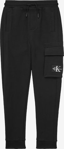 Calvin Klein Jeans - Tapered Calças em preto: frente