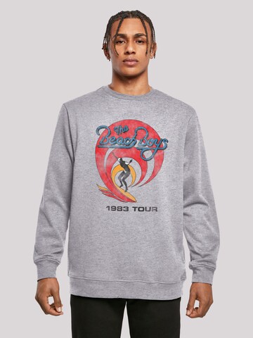 F4NT4STIC Sweatshirt 'The Beach Boys Band Surfer '83 Vintage' in Grijs: voorkant