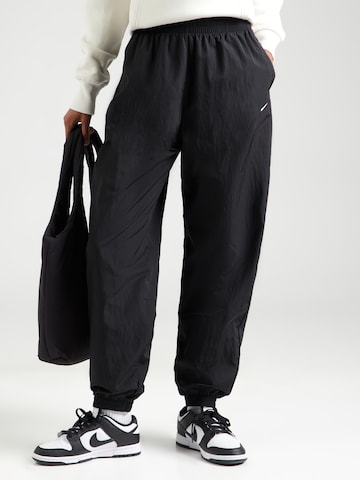 Nike Sportswear Tapered Παντελόνι 'ESSTL' σε μαύρο: μπροστά