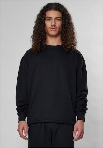 9N1M SENSESweater majica 'Essential' - crna boja: prednji dio